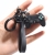 brelok, zawieszka, zawieszka do kluczy, ozdoba, gadżet, praktyczny, brelok z tworzywa, gumowy brelok, czarny brelok, pad, pad playstation, pad do gry, prezent dla niego, prezent dla chłopaka,