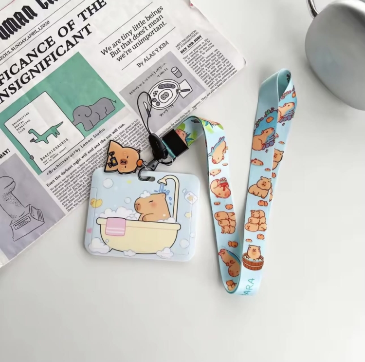 zabawne etui na dokumenty lub identyfikator z brązowym zwierzątkiem kapibara