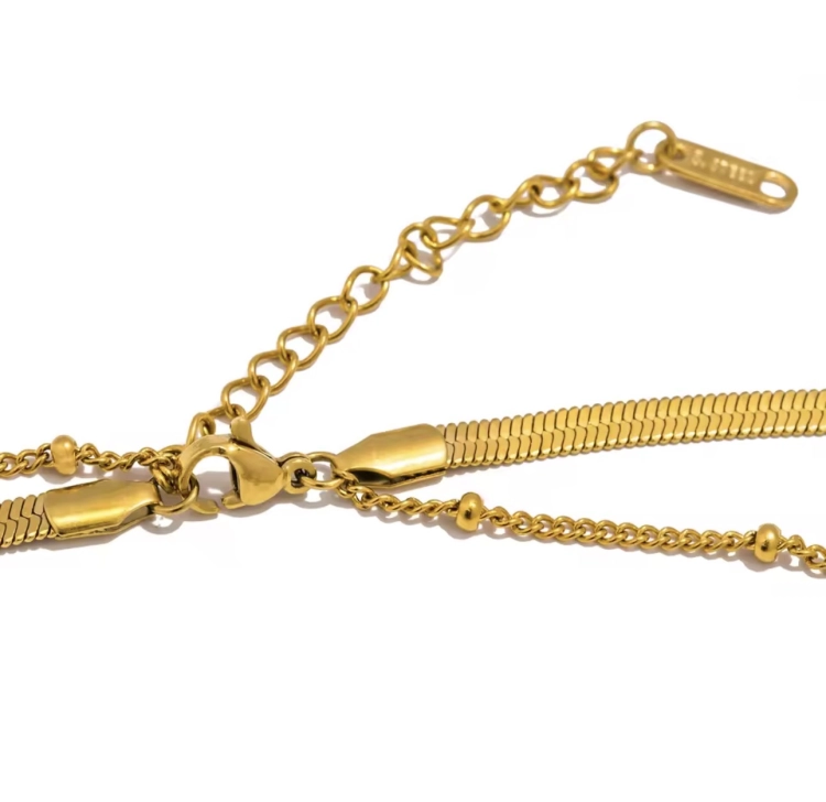 naszyjnik z perełką, naszyjnik snake złoty stalowy, naszyjnik choker, naszyjnik złoty, naszyjnik choker, naszyjnik łańcuszek typu żmijka, naszyjnik elegancki, złoty naszyjnik celebrytka, łańcuszek zakręcany, naszyjnik stalowy,